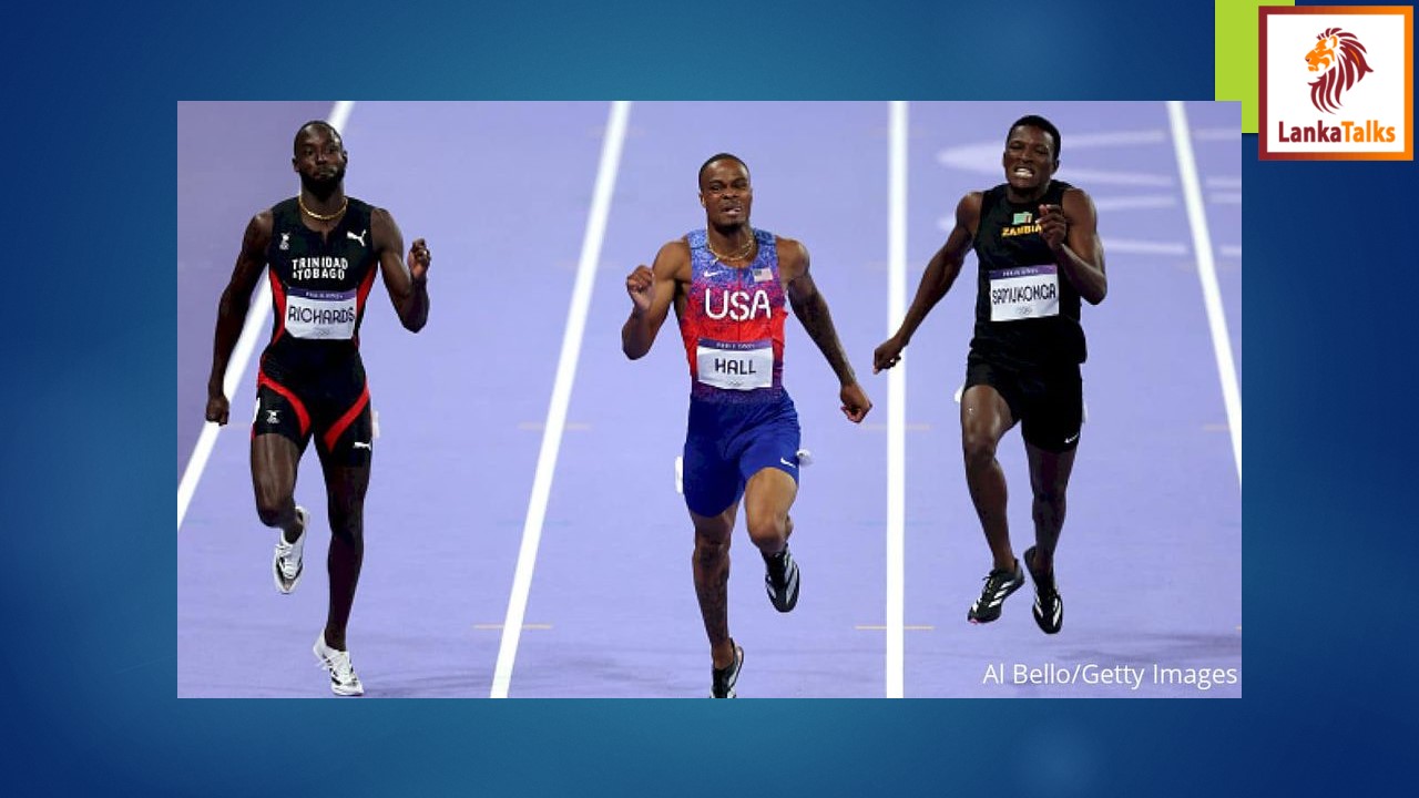 America's Quincy Hall wins the men's 400m Olympic gold medal.