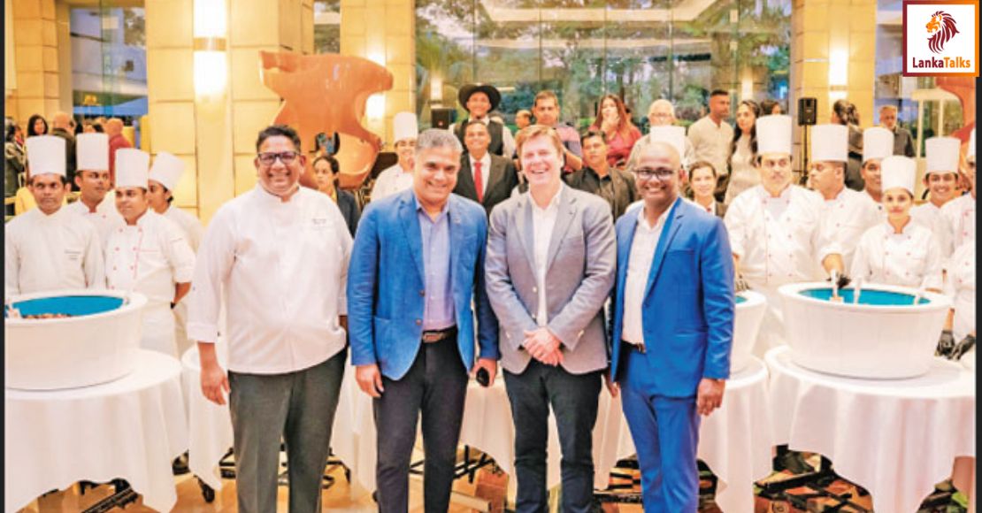 Cinnamon Grand hosts grand Christmas cake mixing