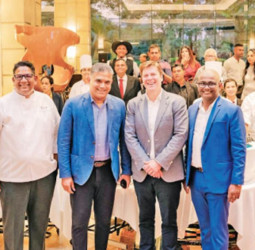 Cinnamon Grand hosts grand Christmas cake mixing