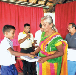 NSB Senior Citizens Circle donates school equipment to students of Palayangoda Vidyalaya