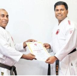 Police Boxing Chairman Seram awarded Black Belt in Karate